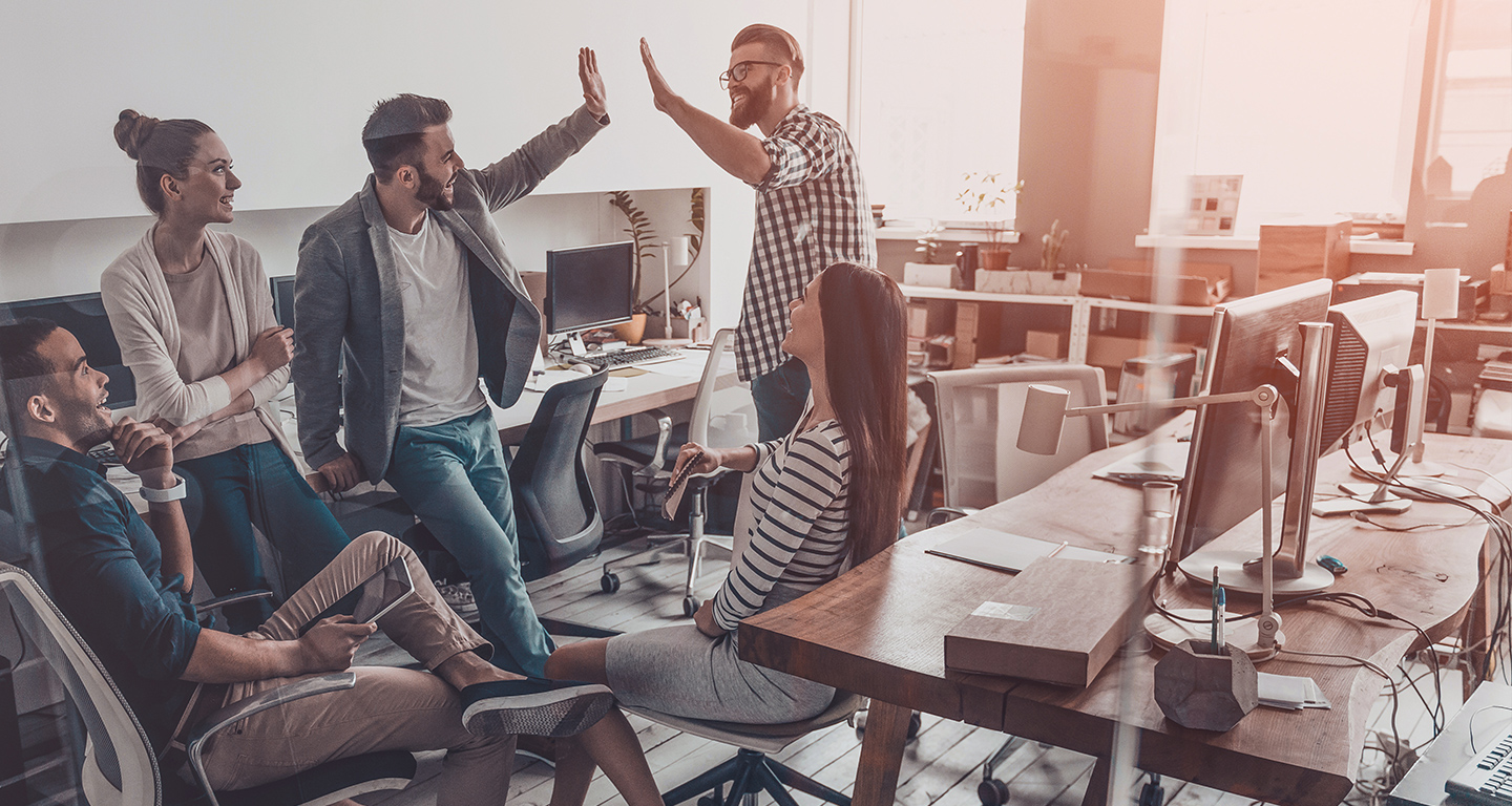 A group of workers in a team meeting